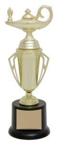 Golden magic lamp trophy on a black base, labeled as the Bravo Cup, located in Edmonton, AB