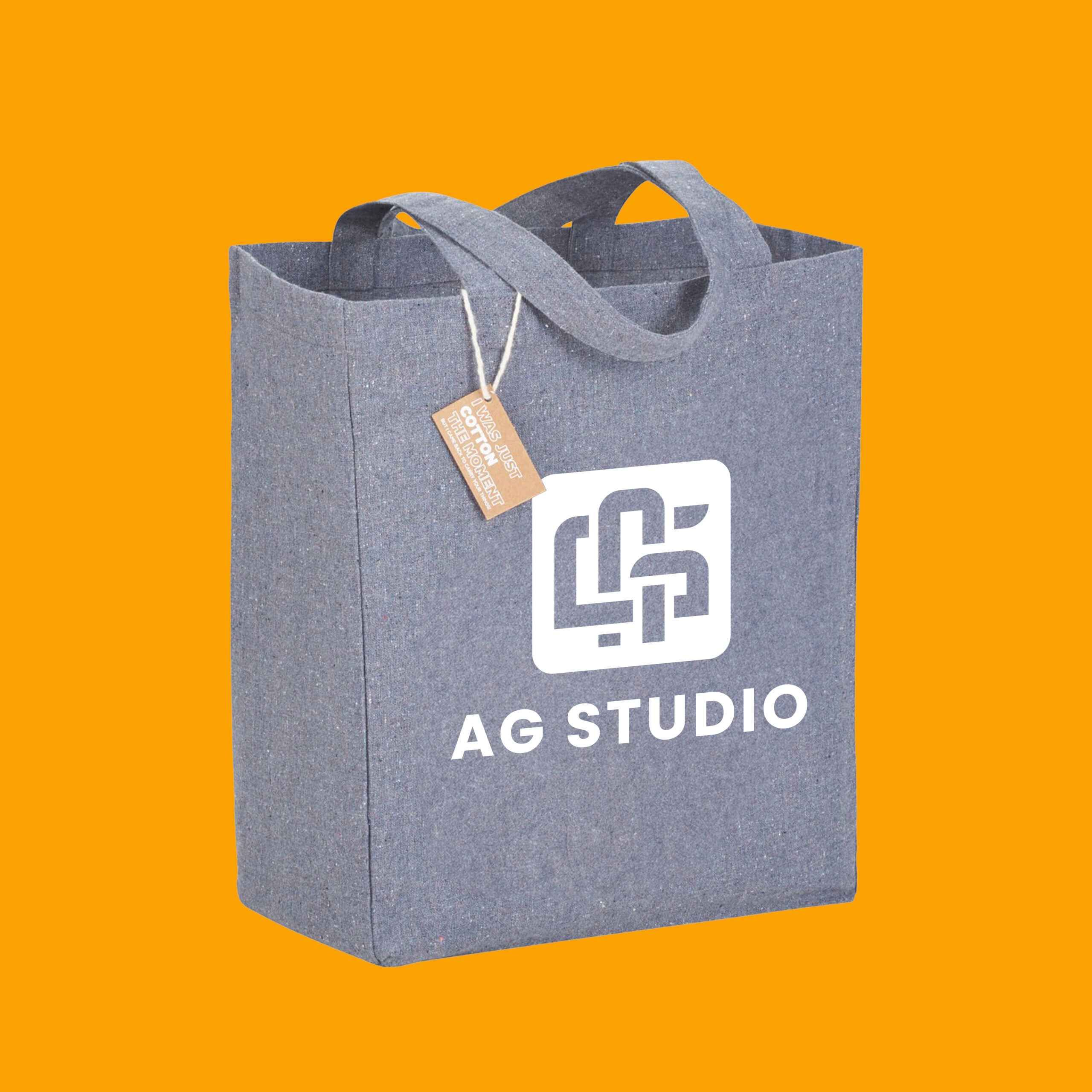 Grey shopping tote bag with AG Studio logo, perfect for carrying items in Edmonton, AB