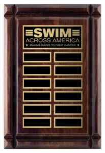 Walnut finish recognition plaque featuring gold plates for engraved names, shown as a promotional award item in Alberta, CA