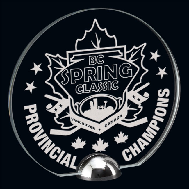 Round glass award featuring BC Spring Classic Provincial Champions design displayed as a promotional trophy in Alberta, CA