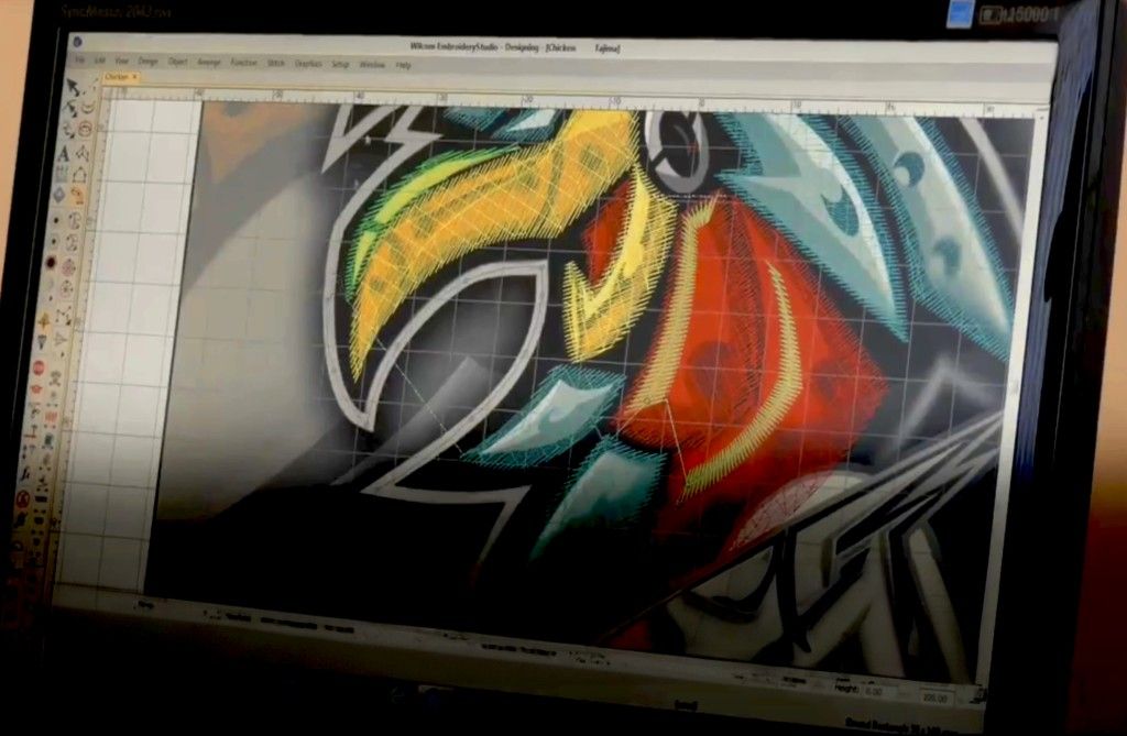 Digital embroidery artwork design displayed on screen for custom promotional branding in Alberta, CA