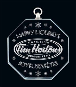 Custom engraved glass holiday ornament for corporate gifting and seasonal promotions in Alberta, CA