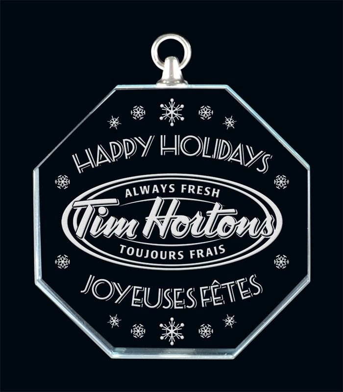 Custom engraved glass holiday ornament for corporate gifting and seasonal promotions in Alberta, CA